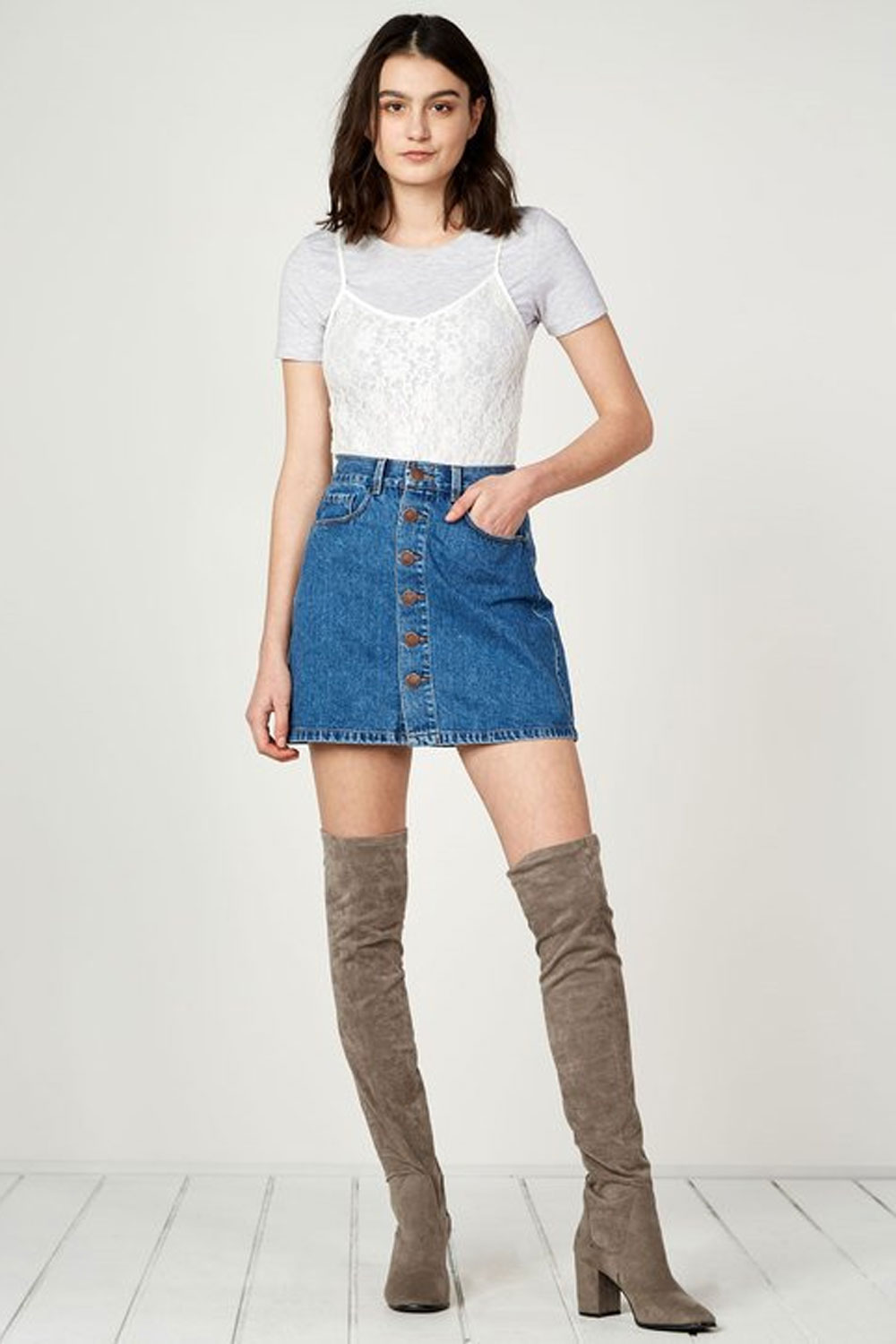 denim skirt with thigh high boots